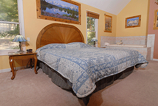 king size bed in a chalet