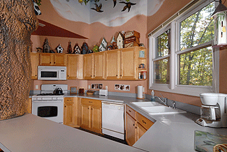 fully equipped kitchen with a dishwasher
