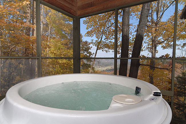 hot tub with a mountain view