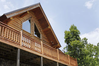 Tennessee Vacation Cabin Rental that is a Two Bedroom Plus a Loft Bedroom Log Cabin located in the woods but still convenient to area attractions