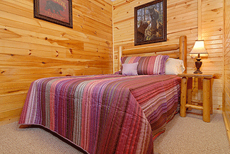 Third bedroom surrounds you with the warmth of wood