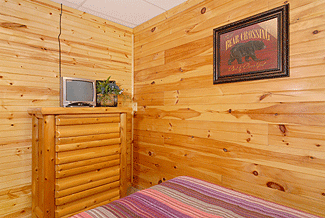 Wood bedroom with TV
