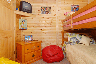 Bunk beds with beanbag and TV