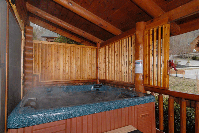Ahhhh... relax in your hot tub on the covered porch