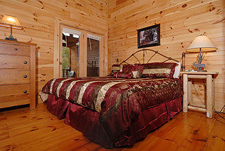 cabin bedroom with king bed