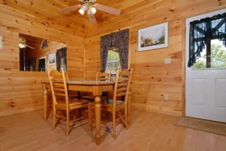 cabin with a dining area
