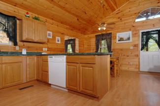 fully equipped kitchen with dining area
