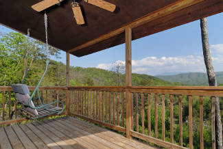 porch swin overlooking a mountain view