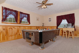 cabin gameroom with pool table