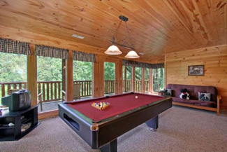 Gameroom area featuring a pool table with an elegant all wood interior