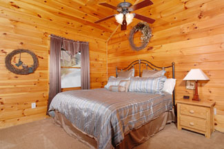 Pigeon Forge Seven Bedroom Cabin Rental with Two Master Suites that feature a private indoor whirlpool