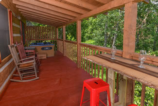Pigeon Forge One BEdroom Plus Loft Cabin Rental Deck Area with Year Round Covered Hot Tub
