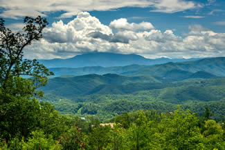 Pigeon Forge One Bedroom Plus Loft Cabin Rental with a Large Mountain Range View