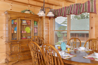 Pigeon Forge Dinning Area with a Dinning Room Hutch