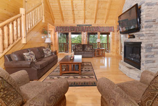 Pigeon Forge Four Bedroom Cozy Cabin Rental with a large livingroom area
