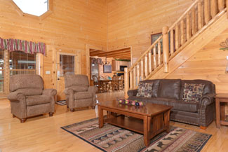 Pigeon Forge Four Bedroom Cabin Rental that features a surround sound theater system and flat screen televelsion