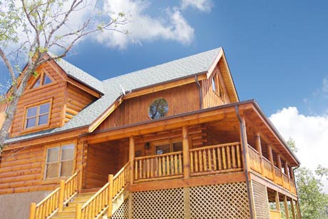 Pigeon Forge Pet Friendly Four Bedroom Cabin Rental near Dollywood with whirl pool hot tub pool table dart board Wii System Internet Access outdoor firepit