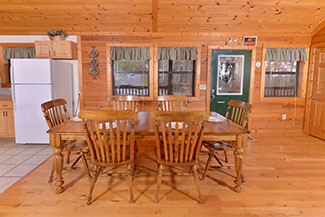 Pigeon Forge Cabin Rental that features a dinning room area