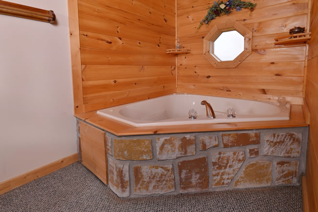 Pigeon Forge Chalet Rental Indoor Whirlpool Area in the main level Master Suite