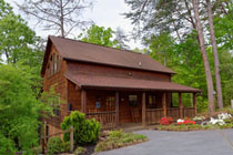 Pigeon Forge Private Three Bedroom Cabin with a Gameroom,whirl pools, hot tubs, pool table,dart board, and an outdoor playground area