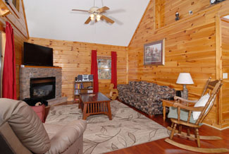 Pigeon Forge Cabin Seating area overlooking a mountain-town view