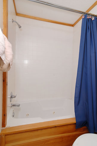 Pigeon Forge Three Bedroom Cabin Rental that features a whirlpool