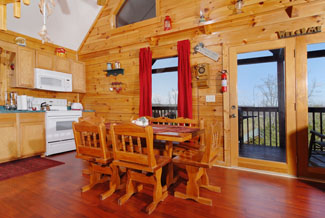 Pigeon Forge Cabin that features a seating table for six guests
