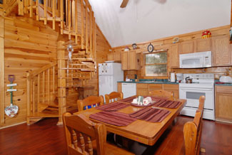 Pigeon Forge Cabin that features a Spiral Staircase to the second level gameroom area