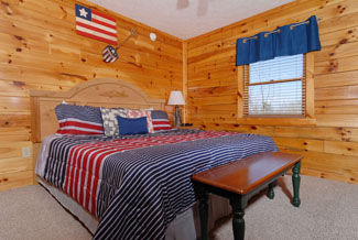 Pigeon Forge Three Bedroom Cabin with a Main Level Bedroom that also features a bathroom with a Whirlpool Area