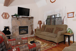 Pigeon Forge One Bedroom Chalet that features a seating area.