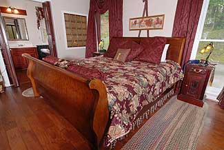 king size bed in the master bedroom on the main level