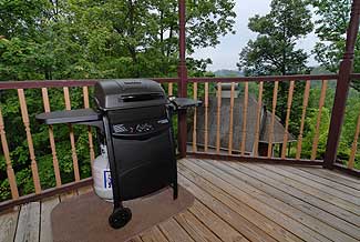gas grill on a covered deck