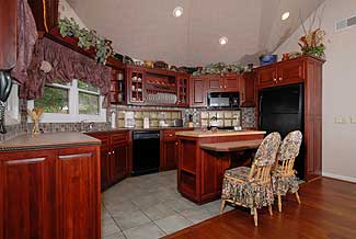 deluxe kitchen with a bar