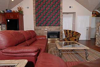 living room with a gas fireplace 