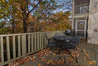 deck with a wooded view