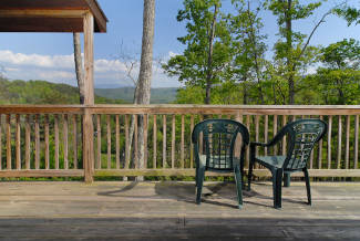 secluded cabin with a mountain view