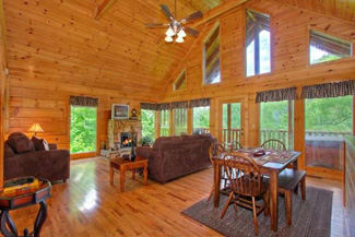 Pigeon Forge Log Cabin with High Ceilings with an outdoor wooded View