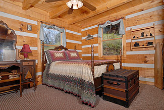 Charming bedroom with antiques and quilts