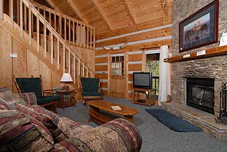 Large living room with stone fireplace