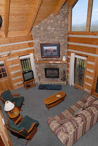Stone fireplace with comfy seating all around