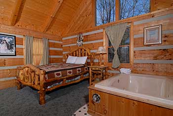Charming log bed next to your own indoor whirlpol tub for two