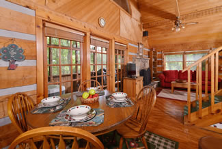 Pigeon Forge One Bedroom Cabin Rental Dinning Area Leading into the Living Area