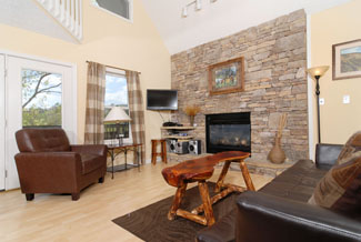 Pigeon Forge Chalet Comfortable Living Room Area with Leather seats in the Living Room