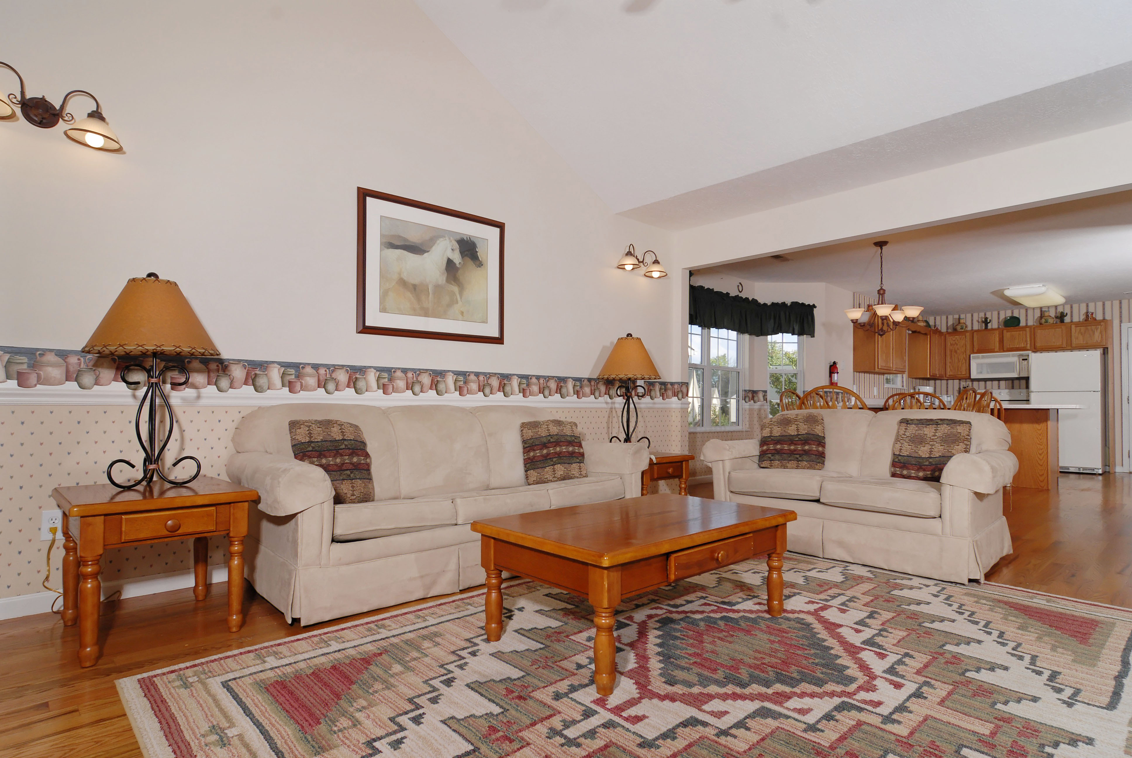 Pigeon Forge Cottage Rental livingroom that leads into the kitchen area