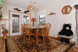 Pigeon Forge Chalet that features a dinning area that overlooks the living room area