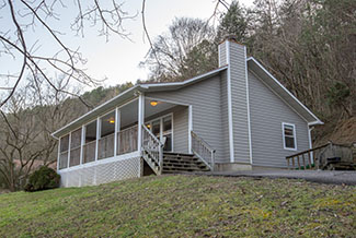 Pigeon Forge Two Bedroom Cabin Rental with a Hot Tub and Pool Table