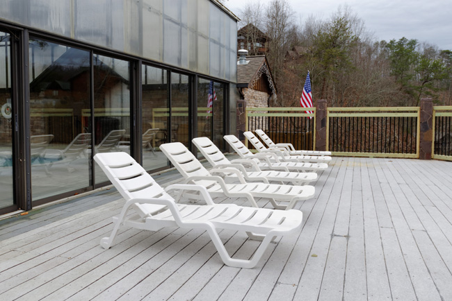 Pigeon Forge Resort Area that has an outdoor sun tanning area and indoor swimming pool area