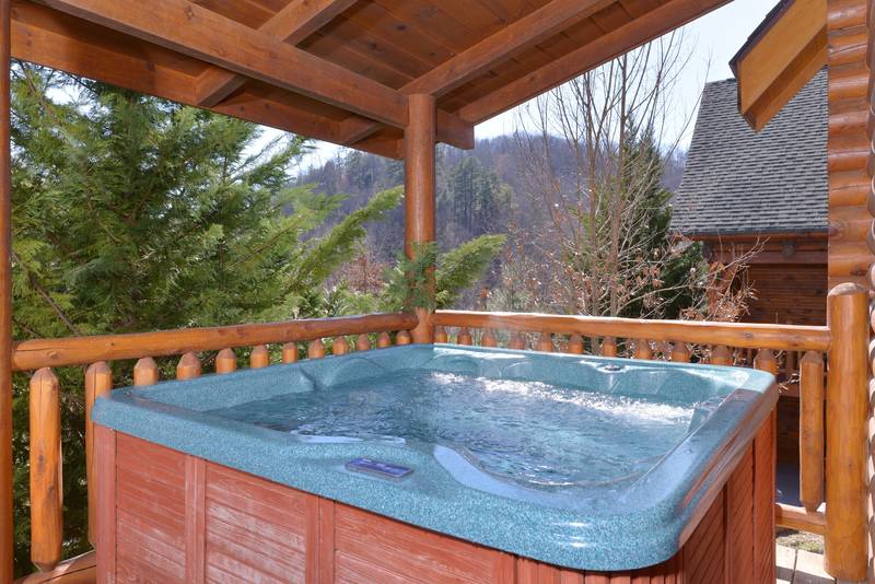 Pigeon Forge Cabin Rental with an Outdoor Hot Tub on the Covered Porch
