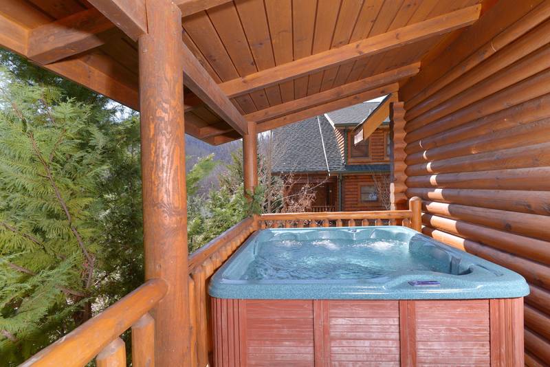 Pigeon Forge Cabin Rental with an Outdoor Hot Tub on the Covered Porch