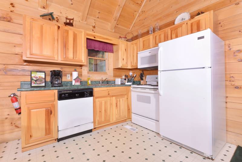 Two bedroom cabin that features a fully equipped kitchen